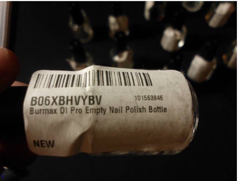 lot 220 image: NAIL POLISH BOTTLES