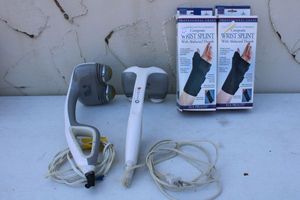 lot 22 image: Homedics massagers and wrist splints (r and L unopened)