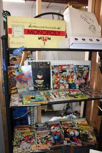 lot 62 image: Comic book collection, Monopoly game, and more