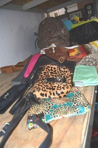 lot 78 image: Purses and bags includes laptop bags and backpack