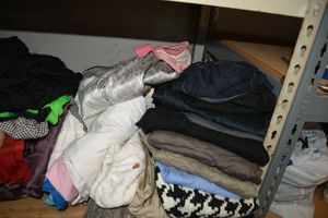 lot 80 image: Womens clothes, curtains, tablecloths, and scrubs