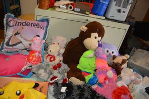 lot 84 image: Stuffed animals, pillows and puzzles