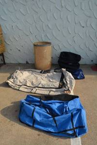 lot 156 image: Large canvas bags with trash barrel