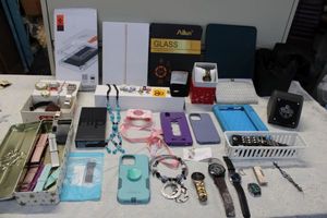 lot 157 image: Empty phone cases and watch boxes, extra watch bands, watches, tablet glass protector sheet, see photos.