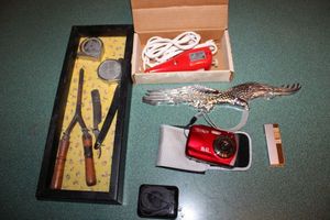 lot 24 image: Antique curling iron and shaving blade, Electric Pencil Engraver, mini camera, lighter and more
