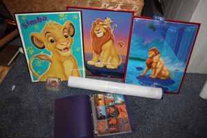 lot 7 image: The Lion King posters and trading cards