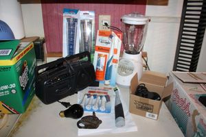 lot 70 image: Sonic Scrubber cleaning brushes, Blender, portable radiocassette player, Rain Gauges, Vintage cast iron lock