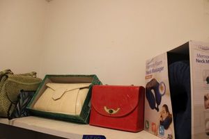 lot 112 image: Vintage purses and memory foam neck massager (still in box)