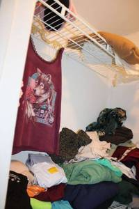 lot 115 image: Womens Tennis shoes and clothes as shown. Plus pink fuzzy slippers.