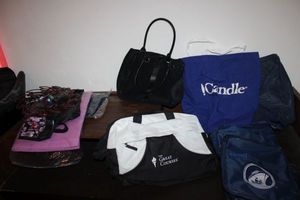 lot 130 image: Misc. lot metal sun, purse, bags, punk sheet (unopened), backpack