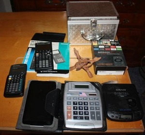 lot 183 image: Amazon Fire TV (still in Box), Calculators, portable CD player, and Hookah set
