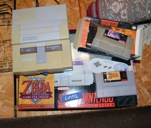 lot 152 image: Vintage Super Nintendo system and games