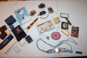 lot 211 image: Shell purse and belt, vintage compacts, hair accessories and empty jewelry boxes