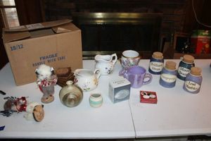 lot 239 image: Native American figurines (appears made with real fur), flowery bowls and pitchers, pottery set (includes marbles)