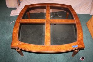 lot 240 image: Coffee table with 4-part glass top