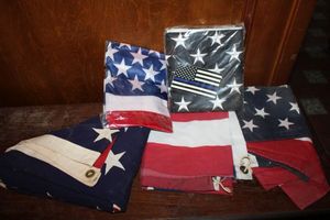 lot 265 image: Flag lot - American flags and police blue line flag