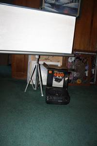 lot 228 image: Vintage projector and tripod screen as shown