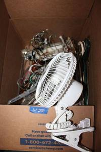 lot 237 image: Clothes hangers and small clip fan