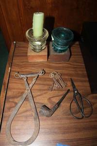 lot 243 image: Vintage tools, pipe, keys and vintage light pole glass insulators (used as candle holders)