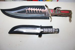 lot 305 image: Knives USA Survivor blade and Bowie knife, see photos. Both have sheathes.