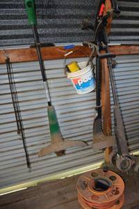 lot 352 image: Weed eaters and yard trimmers, extension cord and reel