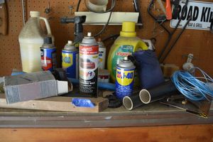 lot 359 image: Automotive cleaners Carburetor cleaner cleaning waxWD-40, weed eater line, Vigoro Root stimulator