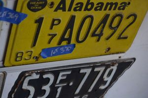 lot 370 image: License plates - 14 - Specialties - Alabama, Virginia National Guard, Michigan 52, Tenn, 56, Privado 81, Alabama 65, Kansas  67