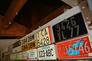lot 375 image: License plates - 9 European plates and 1 Peach State
