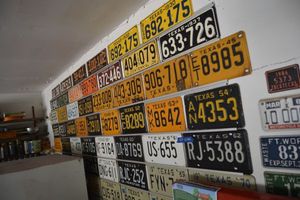 lot 394 image: License plates - 62 Texas in order by year