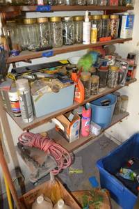 lot 399 image: Garage storage shelf contents - 3 shelves -  hardware, paint thinner, bucket, extension cord, Hatchet