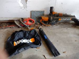 lot 373 image: WORX Leaf blower with vac bagger and Black & Decker Hedge Hog Trimmer