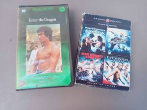 lot 23 image: Dragon 5 Movie Set Enter the Dragon VHS and 4 Film Set Including Executioners from Shaolin,  Jet Li Martial Arts of Shaolin, Mad Monkey Kung Fu, and  Five Shaolin Masters