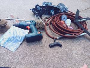 lot 27 image: Bulk Mixed Tools and Parts Set Including Black and Decker 7.2v Versa PAK Drill, Workshop Rulse Sign, Large Bulk of Metal Coil Nails, WetDry VAC Foot and Caster Set, Saw Blades, and MORE