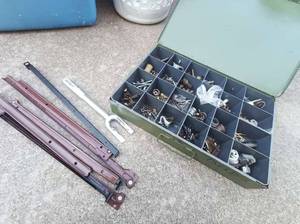 lot 38 image: 125 Mixed Set Including Vintage Metal Small Parts and Components Storage BinToolbox, Long Pickle ForkTie Rod End Splitter, Slide Rail Roller Drawer Brackets, & Multi Mixed Parts