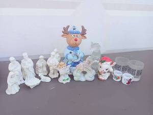 lot 75 image: Mixed Holiday Decor and Cups Including Reindeer Lantern, Vintage White Bisque Galzed Nativity Set,  Vintage Napco Christmas Reindeer, and MORE
