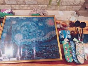 lot 115 image: 10 Pc Mixed Set Including Van Gogh Starry Night Printed in England, (3) Floral Oven Mitts, (2) Spatulas, (2) Toy Spiders, Light Strand, and Large Pack of Wristbands