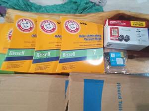 lot 116 image: 10 Pc Mixed Set Including (2) Comfort Seats Round Toilet Seats, (4) Arm & Hammer Odor Eliminating Vacuum Bag Packs, 2 Pack of 4041 Canon Ink, C Ink Cartridge, Snake B Gon, and Microban 24 Hour Sanitizing Spray