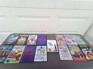 lot 82 image: 15 Pc DVD Set - Including Elmo in Grouchland, The Wiggles, Barneys Musical Scrapbook, Harry Potter, American Idol - The Search for a Superstar, and MORE