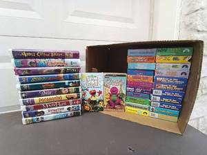 lot 83 image: 34 Piece VHS Set Including Barney Classics, Elmos World The Great Outdoors, Babe, Pocahontas, MouseHunt, Muppet Classic Theater, Dunston Checks In, Bear in the Big Blue House Classics, Scooby Doo, Rugrats, The Flintstones, and MORE