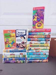 lot 84 image: 20 Piece VHS Set Including The Wacky Adventures of Ronald McDonald The Visitors from Outer Space, Madeline, Matilda, The Parent Trap, The Mother Goose and Much More
