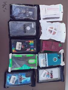 lot 333 image: Set of 10 Phone CasesAccessories Including Disney Stitch, Cinderellas Castle, Minnie and Mickey, and More