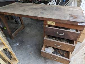 lot 255 image: 3 Drawer Electric Wired Vintage Work Bench w Contents, Including Vintage Vehicle Gauge, Nuts and Bolts, Vintage Scotch Electrical Tape, Copper Pipes, Scrap Metal, Etc VERY HEAVY - See ImagesDescription