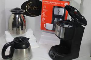 lot 45 image: Coffee Maker and 2 Stainless Caraffes  (not matching)