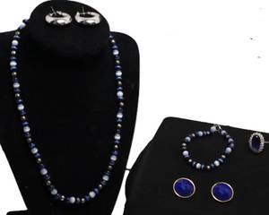 lot 78 image: Vintage Tigers Eye Beads with Matching Bracelet.  A pair of Silver Monet hoops along with other color coordinating items.
