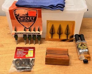 lot 36 image: Nice Lot of Archery Supplies - Including Zwickey Broad Heads, Tarantula String Silencers, &amp Gorilla Epoxy