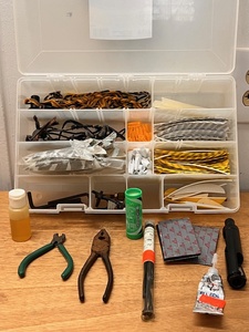 lot 39 image: Fletchers Kit in Plano Case - Including Bow String, Feathers, &amp Tools