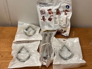 lot 127 image: Assorted CPAP Supplies - Including NEW ResMed Mirage Quattro Mask, Hose, and Three Cushion & Clips