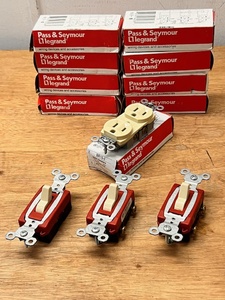 lot 90 image: Nine (9) Pass &amp Seymour L1 legend BR15-I Commercial Grade 15A, 125V Ivory Receptacles &amp Three Light Switches