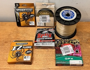 lot 138 image: Six Packs of Fishing Line - Including SpiderWire, Sufix 832, & Cabelas