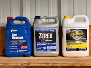 lot 154 image: Three (3) Bottles of Antifreeze - Peak Blue Mountain, Zerex, & Havoline